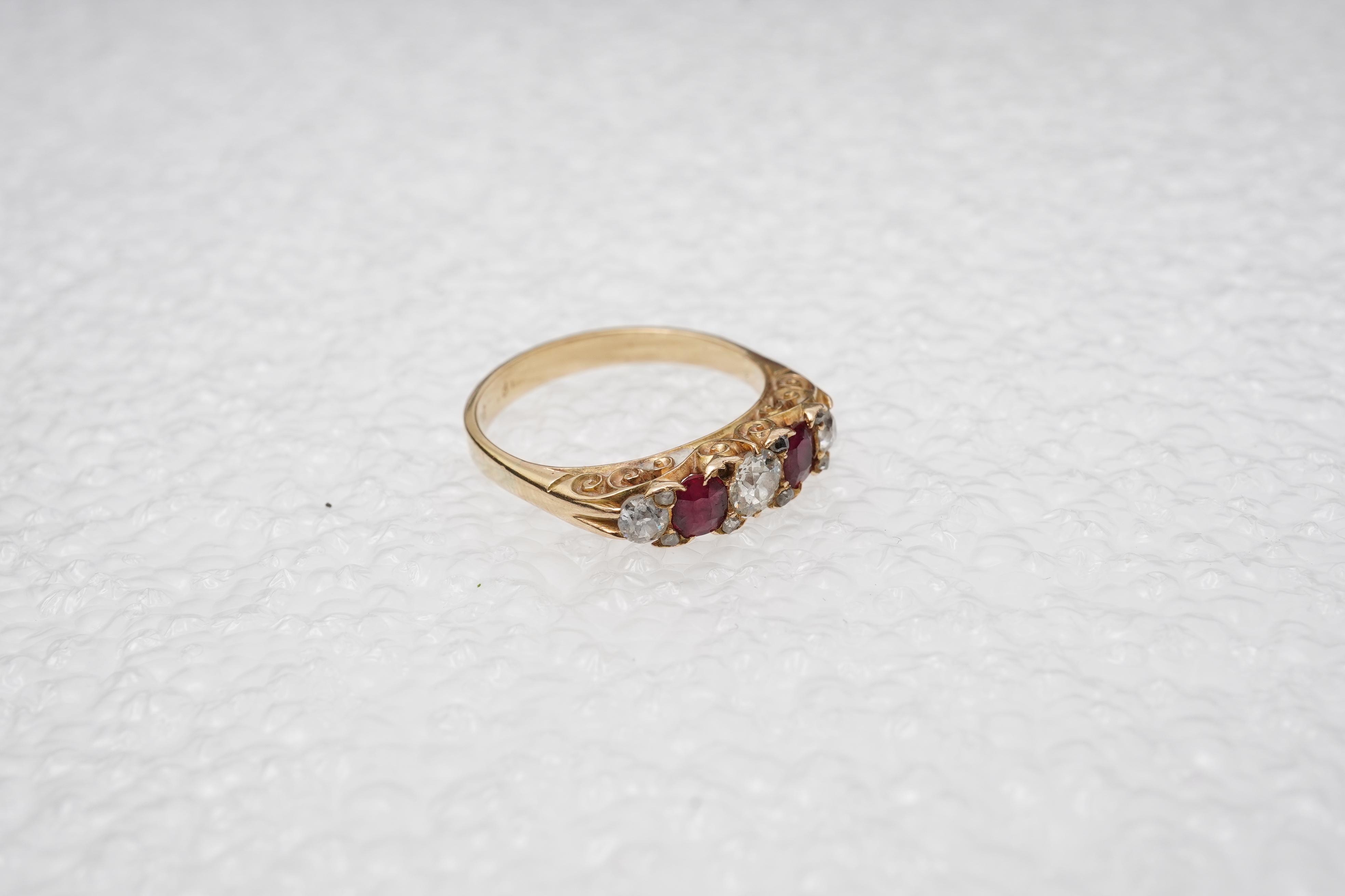 A ruby and diamond five-stone ring, early 20th century
